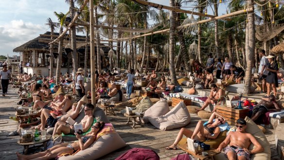 Tourists soaking up the sun in Canggu, Bali, shortly before the pandemic. Visitor numbers to Indonesia have rebounded strongly. 