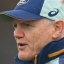 Joe Schmidt rugged up for Wallabies training in Melbourne.