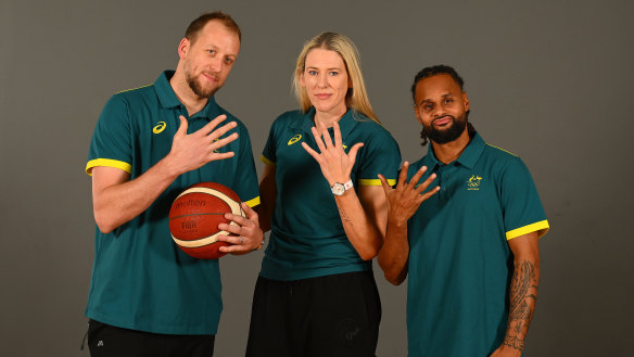 Joe Ingles, Lauren Jackson and Patty Mills pose after being selected for their fifth Olympics.