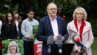 Prime Minister Anthony Albanese with Brisbane candidate Madonna Jarrett on Saturday.