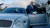 Above: Clive Palmer and one of his Bentleys. Source: Cole Bennetts/Getty Images
