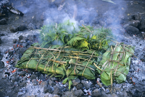 Laplap wrapped with bananas leaves  and cooked on coals, Tanna, Vanuatu.
