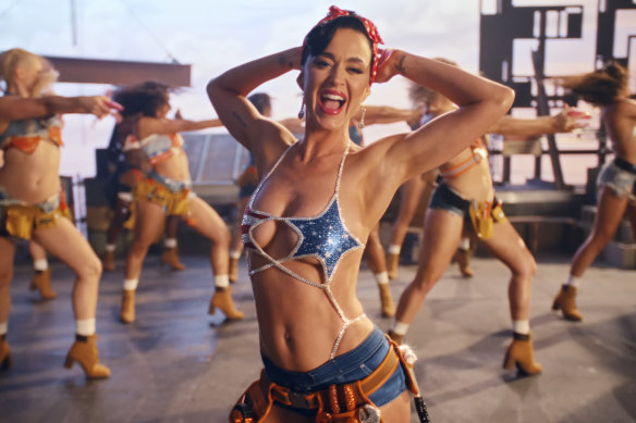 Katy Perry channels sexy Rosie the Riveter in the Woman’s World music video.