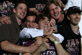 With friends like these: Manly rookie Jamie Humphreys is mobbed by his mates
.