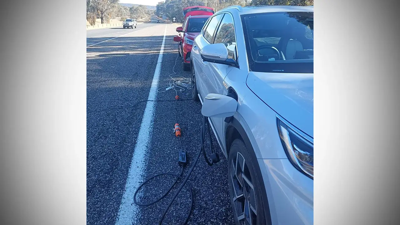 ‘Cheaper than a tow truck’: Electric car owners devise roadside charging solution