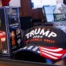 US President Joe Biden and former US President Donald Trump hats and merchandise on the floor of the New York Stock Exchange. 