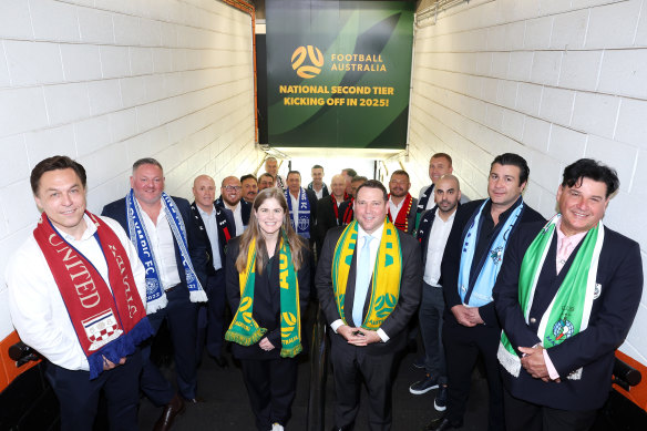 Football Australia chief executive James Johnson and Natalie Lutz, FA’s since-departed head of professional football and competitions, with representatives of the second division’s eight foundation clubs.