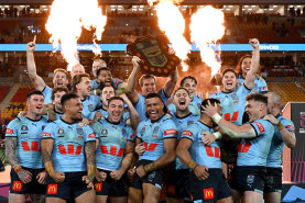 The Blues celebrate with the shield.