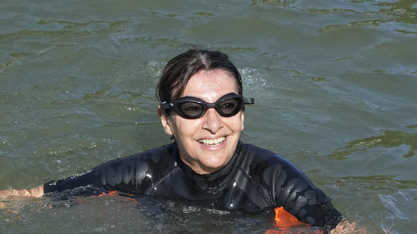 Paris Mayor Anne Hidalgo swims in the River Seine on Wednesday, following through on her vow that it would be clean for the Olympics. 