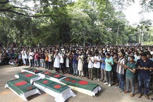 Students advocating for quota reform in public service held a mock funeral at Dhaka University in memory of those who died during clashes, in Dhaka, Bangladesh