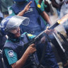 Police kill more than 100 students in protests over job handouts