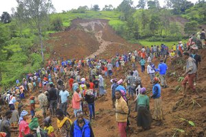 ADDS NAME OF THE PHOTOGRAPHER - In this handout photo released by Gofa Zone Government Communication Affairs Department, hundreds of people gather at the site of a mudslide in the Kencho Shacha Gozdi district, Gofa Zone, southern Ethiopia, Monday, July 22, 2024. At least 146 people were killed in mudslides in a remote part of Ethiopia that has been hit with heavy rainfall, according to local authorities.