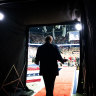 Former president Donald Trump takes the stage for a campaign rally at the Van Andel Arena in Grand Rapids, Michigan on Saturday.