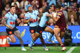 Selwyn Cobbo is tackled by Jarome Luai in the State of Origin decider.