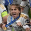 Real Madrid’s players pose with the trophy after winning the Champions League final soccer match between Borussia Dortmund and Real Madrid at Wembley stadium in London, Saturday, June 1, 2024. (AP Photo/Kirsty Wigglesworth)