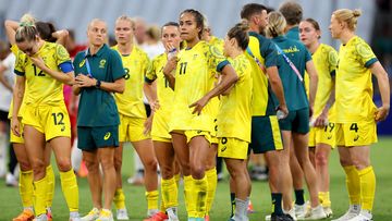 Players from Team Australia (Matildas) show dejection after losing to Germany.