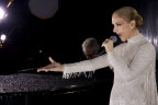 Celine Dion performs on the Eiffel Tower for the Paris Olympic Games Opening Ceremony.