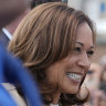 Vice President Kamala Harris greets supporters as she arrives at Westfield-Barnes Regional Airport in Westfield, Massachusetts.