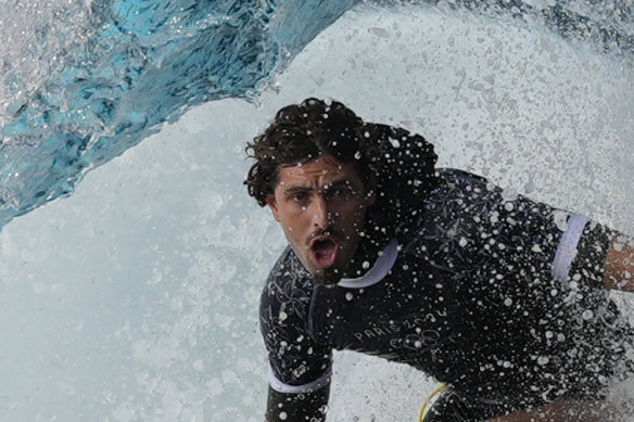 Joao Chianca, of Brazil, in the barrel at Teahupo’o, Tahiti, on a training day ahead the 2024 Summer Olympics surfing.