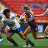 Hayley Maddick of the Broncos hits it up against the Eels.