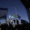 Protesters gather in support of soldiers being questioned for detainee abuse, outside of the Sde Teiman military base.