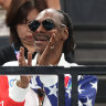 Snoop Dogg cheers during the gymnastics on day two at Bercy Arena.