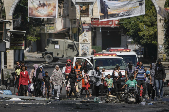 Residents of the Jenin refugee camp fled their homes as the Israeli military pressed ahead with an operation in the area yesterday,