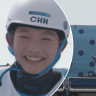 Everyone – including Chinese canoeist Li Shiting – saw the funny side when she wasn't dropped to the water to start her kayak cross run. © International Olympic Committee