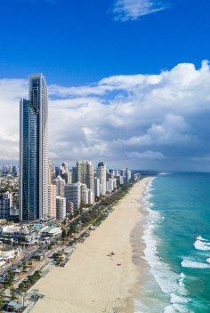 Aerial over ocean surf into the beach of Surfers Paradise Gold Coast Broadbeach, Gold Coast iStock photo