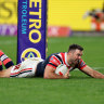 James Tedesco scores a try during the round 21 NRL match against Manly.