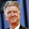 US director David Lynch shows the Golden Lion lifetime achievement award received at the Venice film festival in 2006.