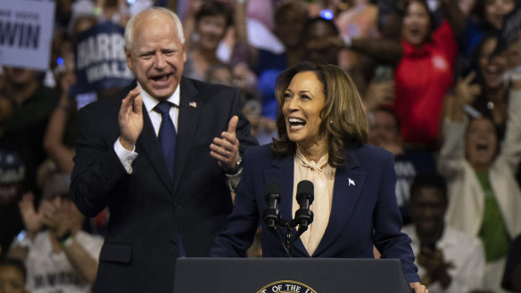 Democratic presidential nominee Vice President Kamala Harris and her running mate Minnesota Gov. Tim Walz speak at a campaign rally in Philadelphia.