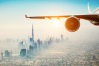 Which airline operates the most flights out of Dubai International Airport?