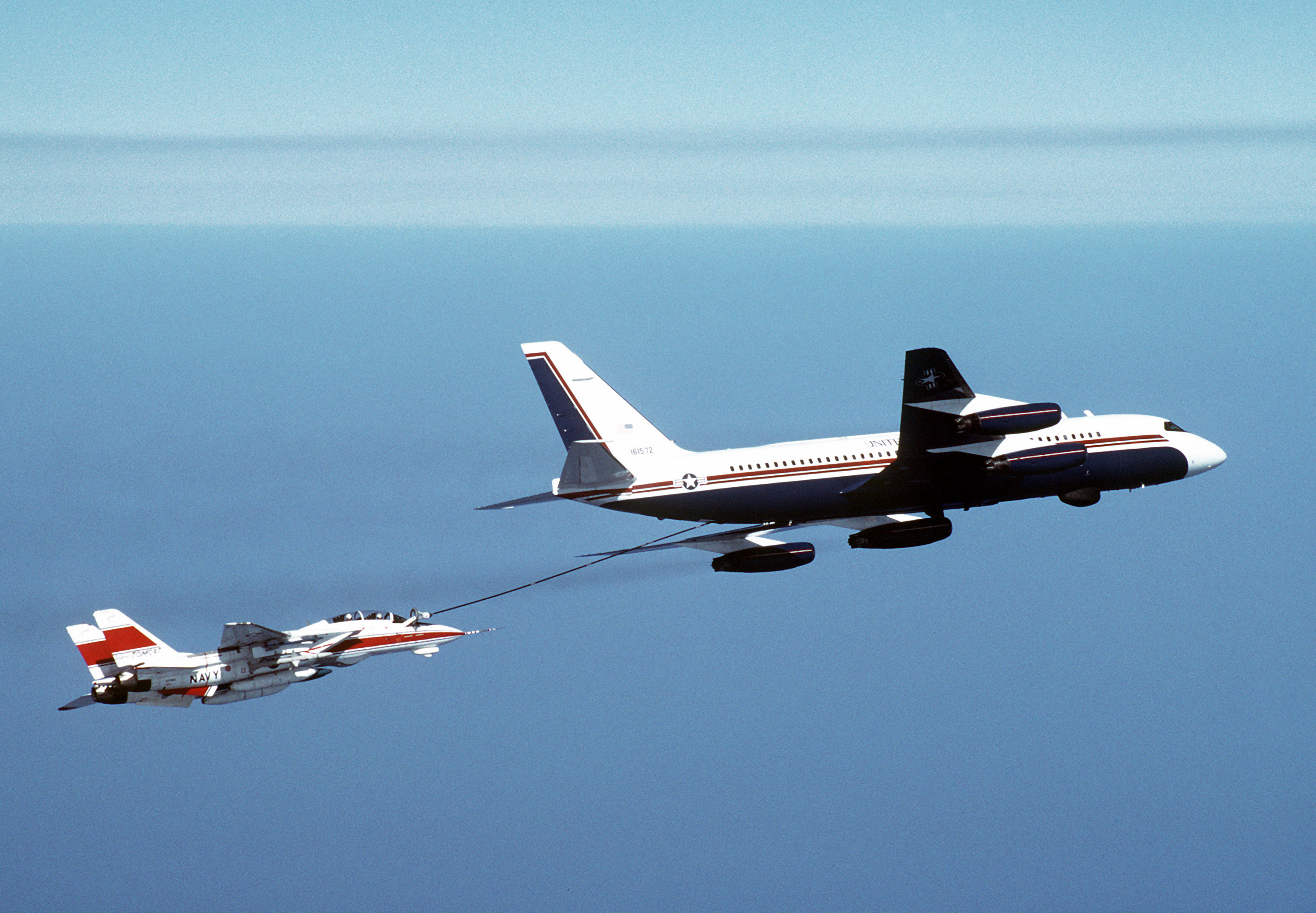 r/aviation - Bit of an odd pairing here, of an F-14D Tomcat being refueled by the USN's sole Convair 880 in 1982.