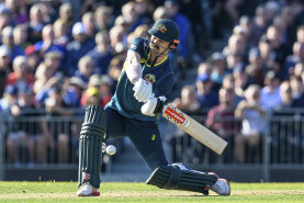 Australia’s Travis Head hits a four during the first T20 International Series Cricket match in Edinburgh, Scotland.