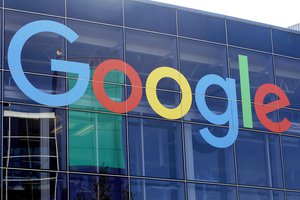 FILE - A sign is shown on a Google building at their campus in Mountain View, Calif., Sept. 24, 2019.