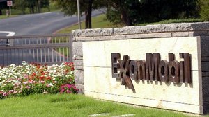  A sign marks the entrance of the secluded Exxon Mobil cooperate headquarters in Irving, Texas, Thursday, Oct. 30, 2003. Higher oil and gas prices helped lift third quarter profits at Exxon Mobil Corp. by 38 percent, but the oil giant still fell far short