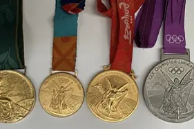 Man arrested over alleged Olympic medal theft from parked car