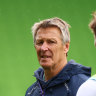 Storm coach Craig Bellamy, left, watches over training on Wednesday.