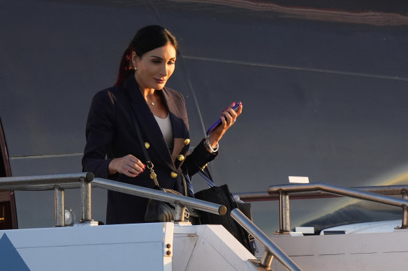 Laura Loomer arrives with Republican presidential nominee Donald Trump at Philadelphia International Airport, for the presidential debate.