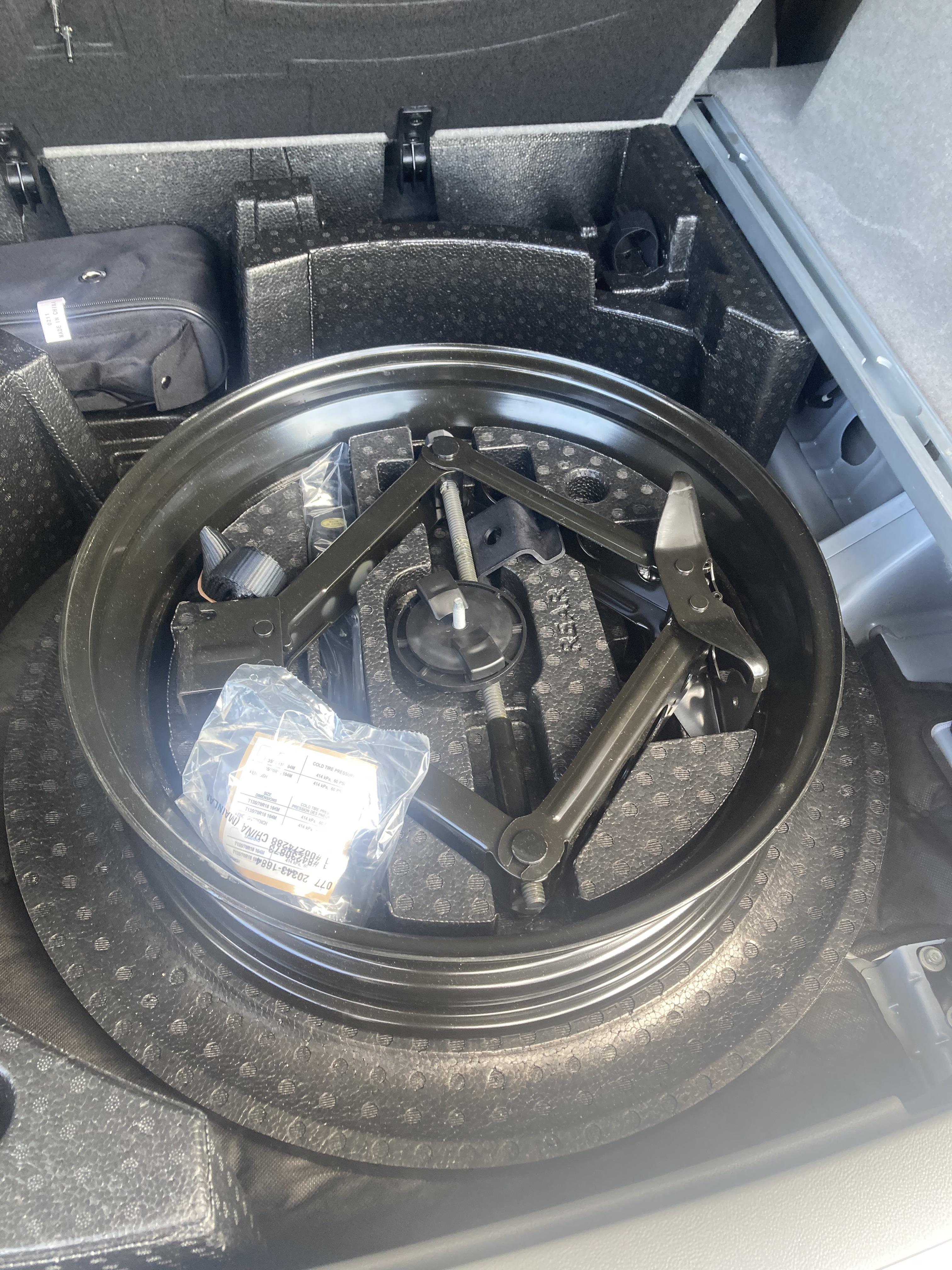 r/Justrolledintotheshop - When you order a "spare TIRE kit" for a new Cadillac, don't you think it should include the TIRE?