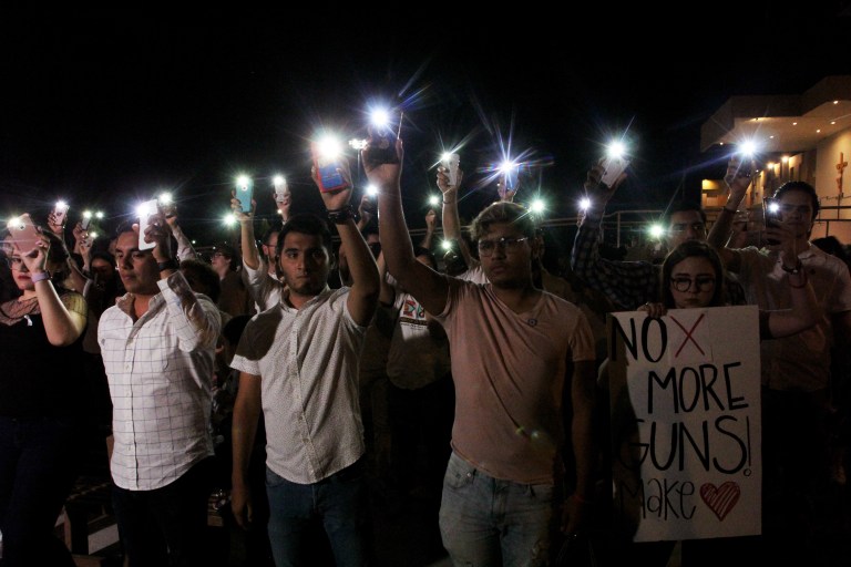 A vigil in Ciudad Juarez, Mexico, on August 3rd, 2019, after a mass shooting left over 20 people dead in El Paso, Texas.