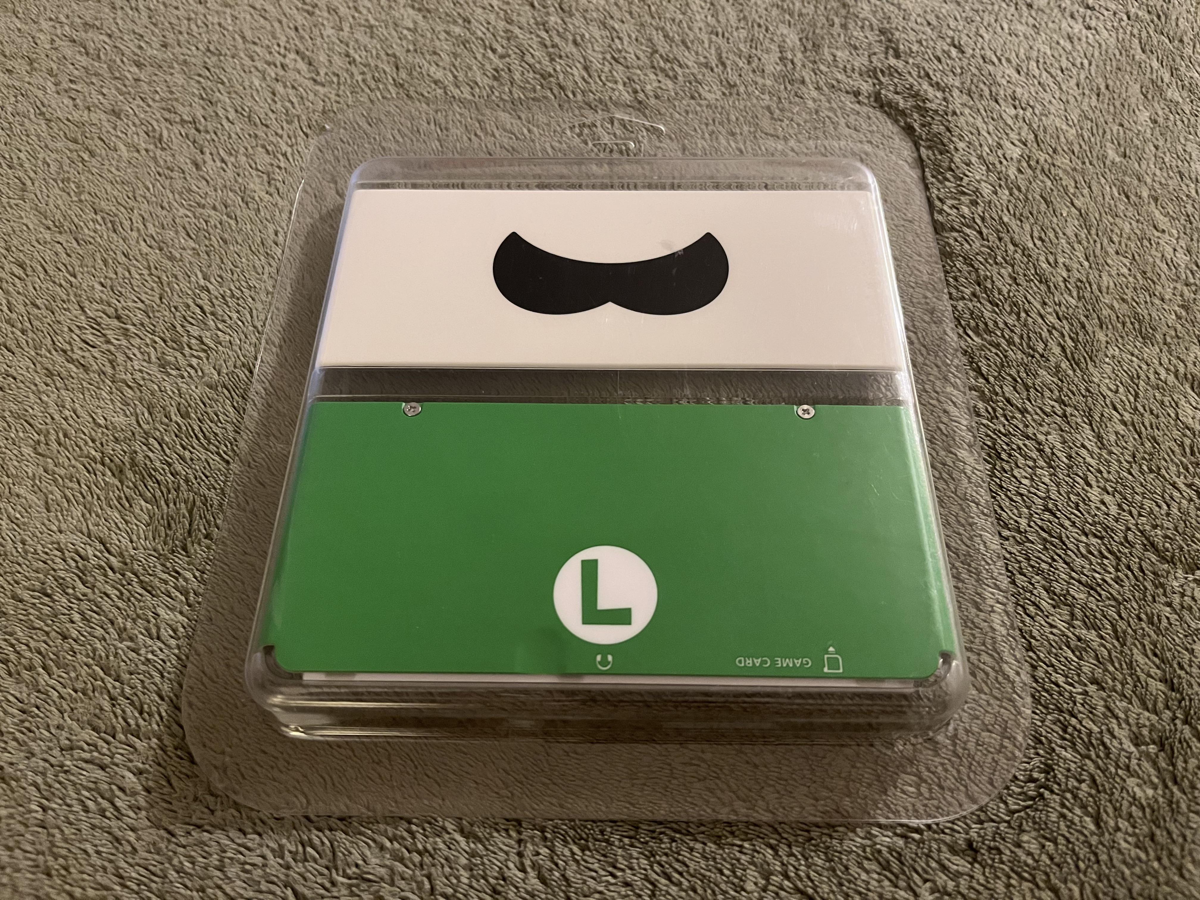 r/3DS - Found these Luigi cover plates at the Portland Retro Gaming Expo last month.