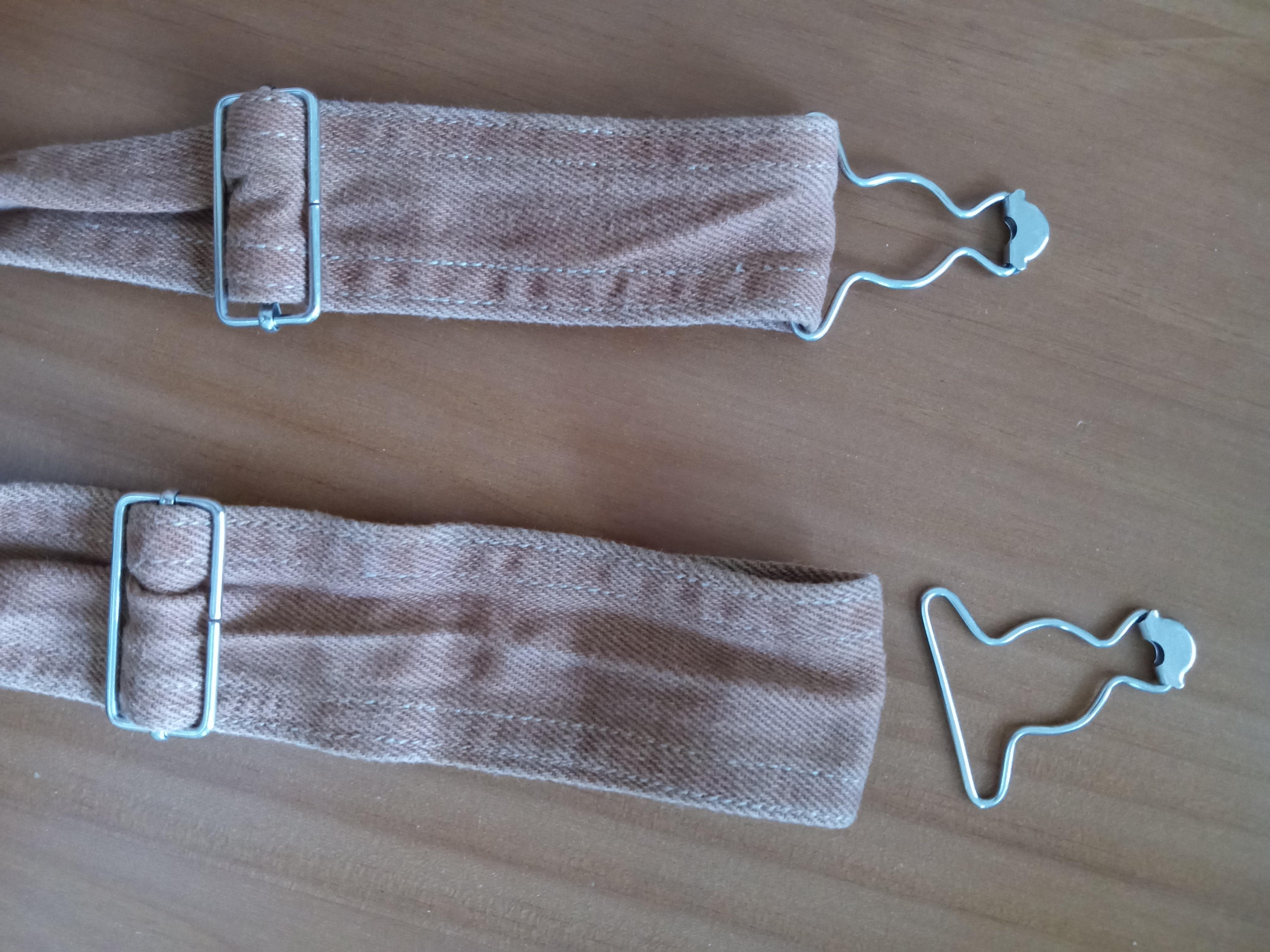 r/mildlyinteresting - Overalls clip came off in the dryer somehow. Both loops fully intact and closed.