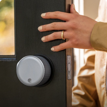 silver smart lock on black door