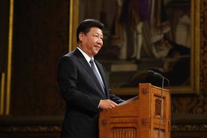 China's President Xi Jinping addresses members of parliament and peers in Parliament's Royal Gallery, Tuesday, Oct. 20, 2015, in London, England.