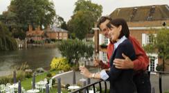 Couple enjoying the view of the River Thames at Marlow