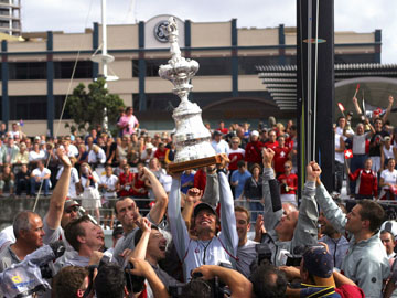 Alinghi celebrate with the Cup in 2003