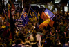 Crowds lined the street as the sailors paraded down the Rua das Pedras