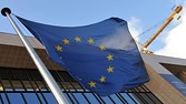 EU flag is seen in front of the EU Commission Headquarters on March 14, 2013 in Brussels, ahead of te two-day European Union summit. European Union leaders try Thursday to find a difficult balance between austerity policies adopted to cut debt and calls to spend more to generate growth and jobs in an economy stuck in the doldrums